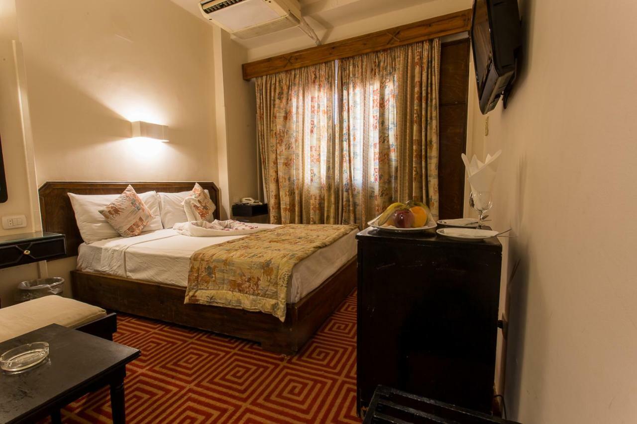 Cleopatra Hotel Aswan Bagian luar foto